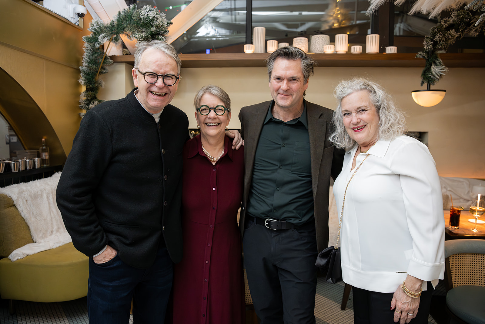 Catherine, her husband, and two HIROC employees stand together smiling.