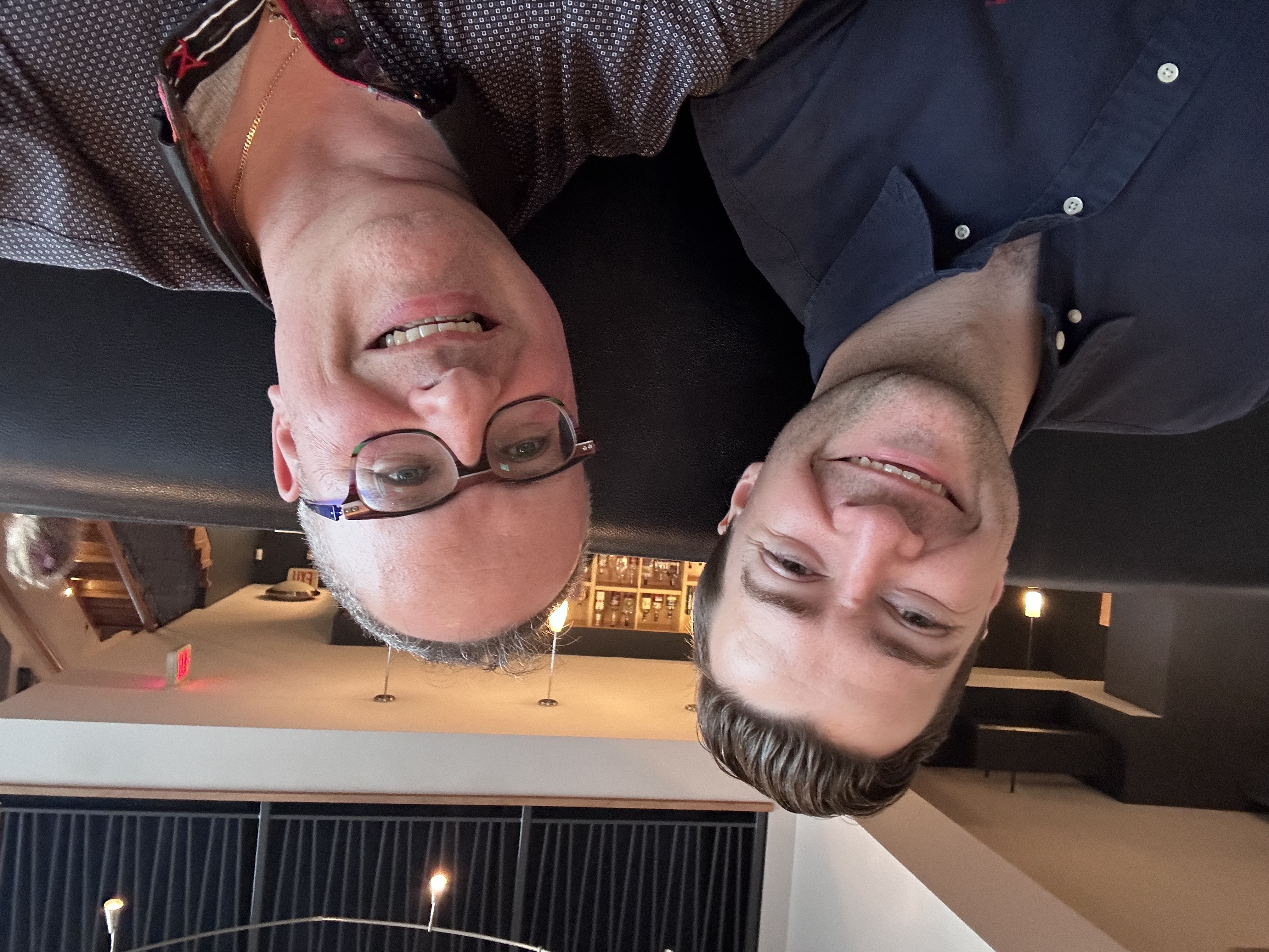 Dr. Doran Drew and Dr. Glenn Posner smiling at the camera.