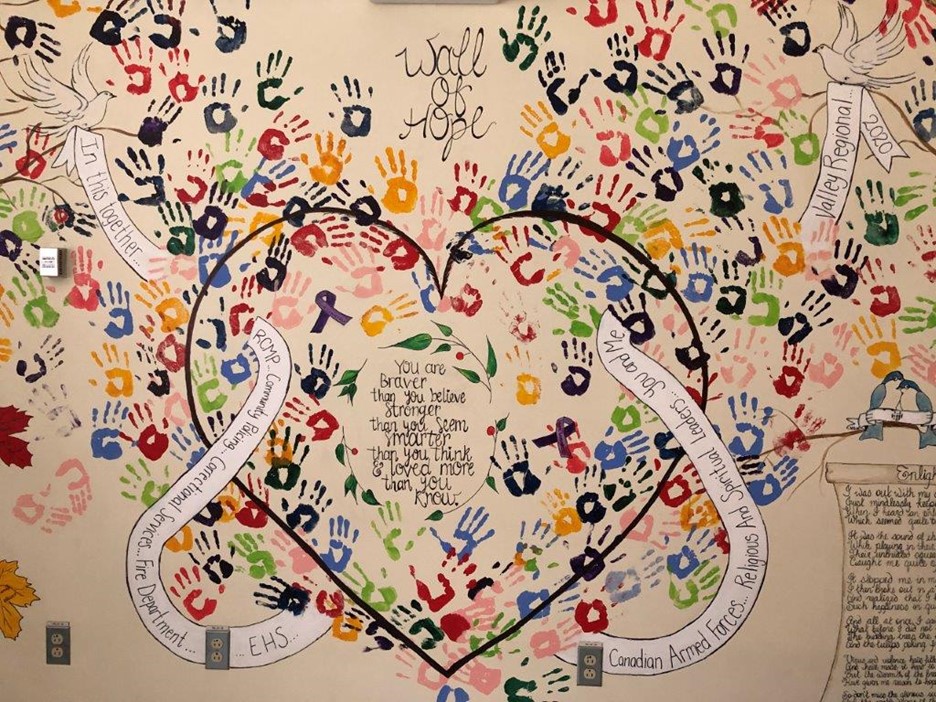 Handprints, messages of hope and gratitude cover the wall of hope. Some staff members even found their working partner’s handprints, and made sure theirs were close by. (Photo: Julie Sutherland-Jotcham, R.N.)