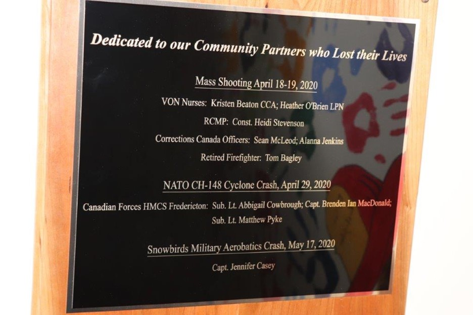 Plaques commemorating those affected by three tragedies in Nova Scotia, accompanying the wall of hope. (Photo submitted by Debra Orton)