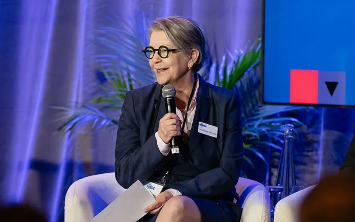 Catherine Gaulton speaking on stage at the 2025 HIROC AGM & Conference.
