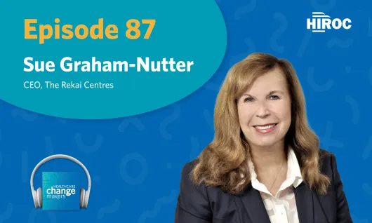 Banner saying "Episode 87" in yellow, and a picture of our podcast guest Sue Graham-Nutter wearing a black blazer.