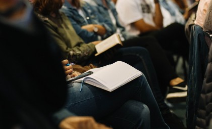 Image of audience at a conference or meeting