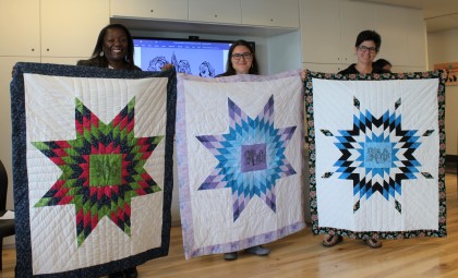 Quilts commemorating the Three Sisters Accord between the Toronto Birth Centre, Women's College Hospital, and Seventh Generation Midwives Toronto.