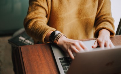 person working at laptop