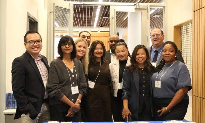 A group of HIROC staff smiling at HIROC's Facilities Forum