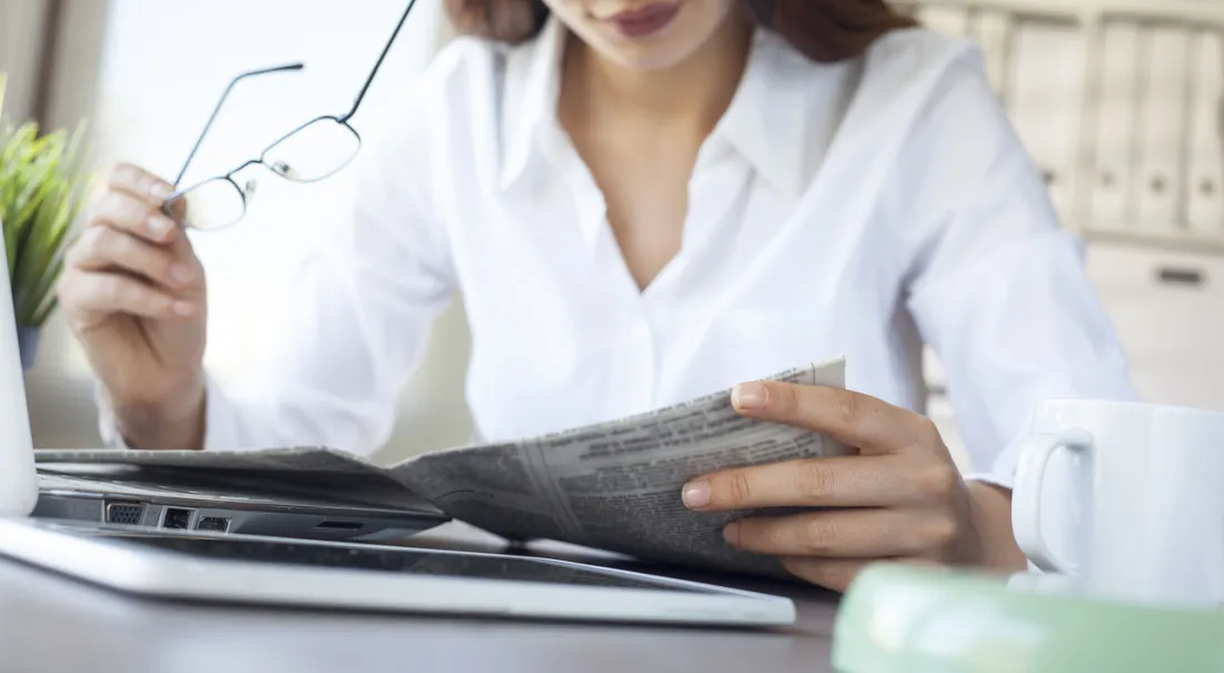 Someone reading the news