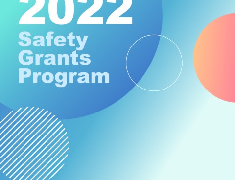 promo image says 2022 safety grants program, blue circles in background